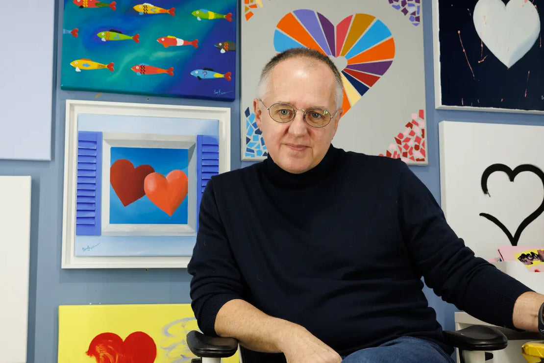 Sam Grudge with gallery wall of hearts