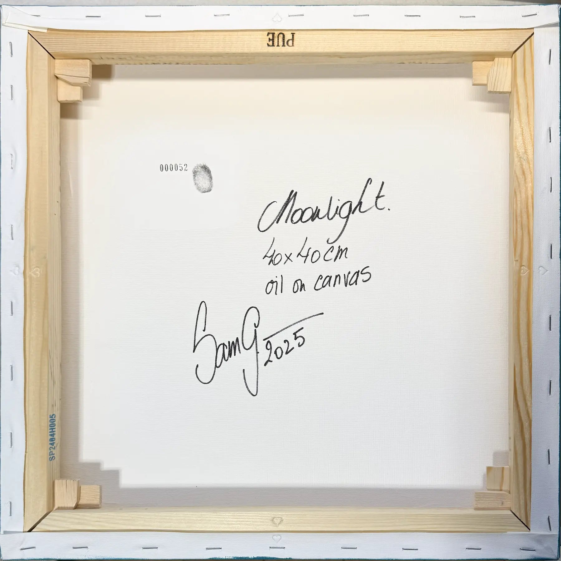 An original painting’s signed back, fingerprint, serial number and heart-stamped chassis.